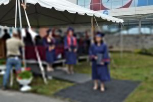 Graduates walk at Atlantic Cape Community College's ceremony