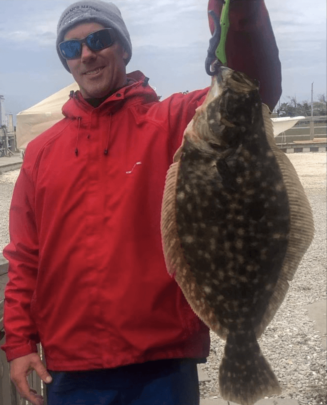 Charlie Gould and his 3.33-pound flounder.