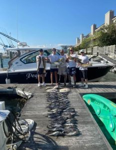 The crew from Pequod Sportfishing with their bounty.