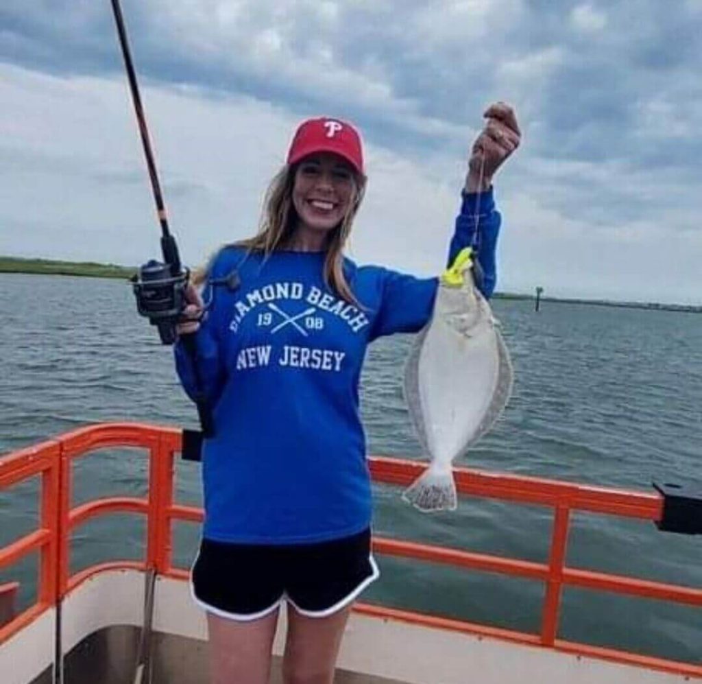 A happy ladyangler with a nice flounder.