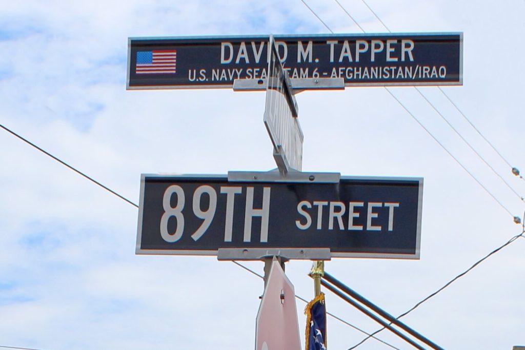 A sign engraved with the name of fallen Navy SEAL David Tapper was unveiled in Sea Isle City at the intersection of 89th Street and Landis Avenue on June 11.