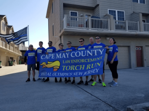 Participants pose for a picture for a past Torch Run in support of the Special Olympics.