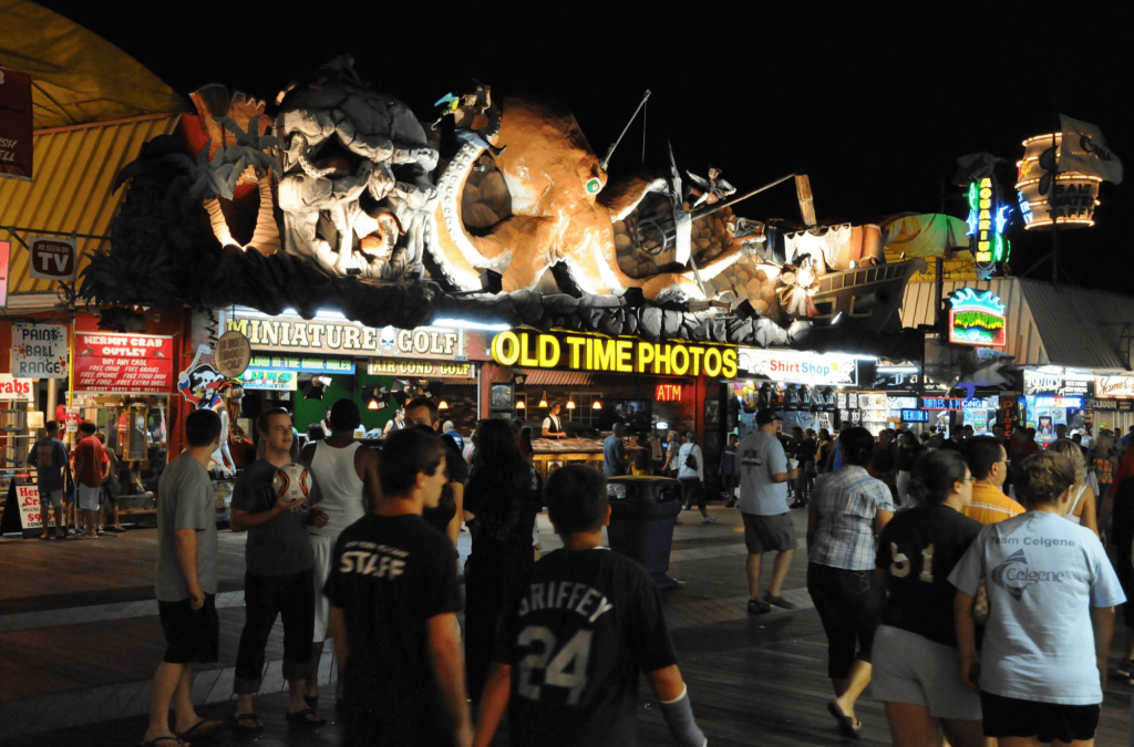 kids on boardwalk at night.png