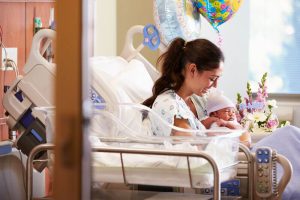 maternity ward mother newborn baby prenatal neonatal stock