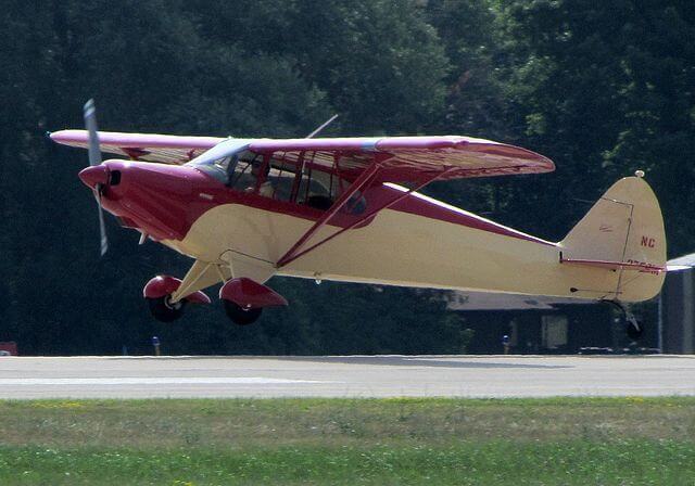 A Piper PA-12 lands. Gibson was flying the same model when the plane fatally crashed July 16.