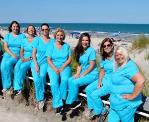 The Sea Isle Smiles staff at the Sea Isle City beach.
