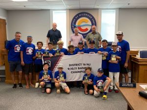 Pictured are the coaches and players from the Greater Wildwood 11-year-old Little League baseball team. The team won the District 16 championship after losing their first two games. Wildwood rallied from being down 8-3 in game three to win 11-9