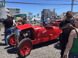 Crowds gather around a vintage car at the 2017 Race of Gentlemen.