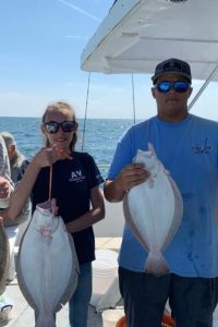 Courtney and Austin with their nice keeper fluke.