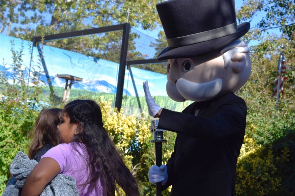 Mr. Monopoly prepares to receive a high five as he greets children at the Cape May County Zoo Oct. 20. 