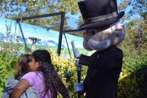 Mr. Monopoly prepares to receive a high five as he greets children at the Cape May County Zoo Oct. 20. 