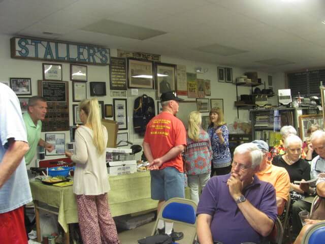 The public files through the Wildwood Historical Society's museum.