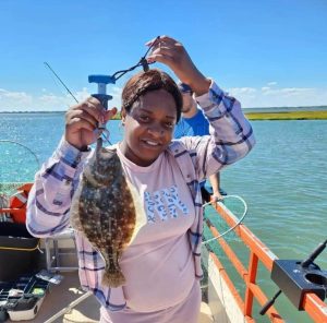 A last-trip of the season flounder for this lady-angler.