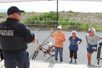 Sea Isle City Police Lieutenant William Mammele speaks with those passing by during “Coffee with a Cop” Sept. 30