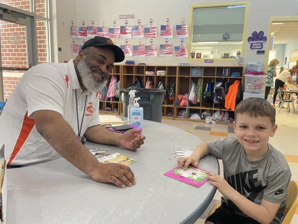 Herman Cruse with kindergartener Corbyn Conroy