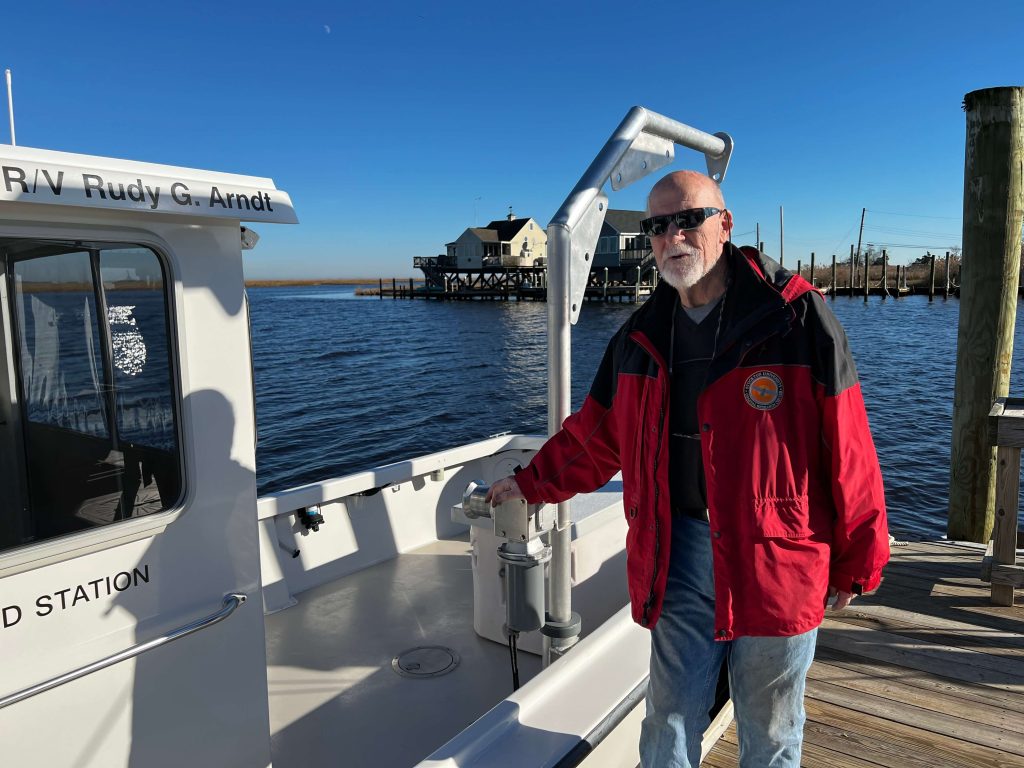 Stewart Farrell stands on the dock at Stockton’s Marine Field Research Center on Nacote Creek