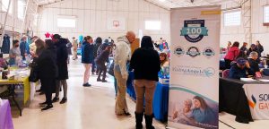 Area residents interacting with local organizations in Tabernacle's Michael Hall gym.