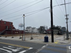 The site of a former bank building will now be a parking lot for a new hotel across the street