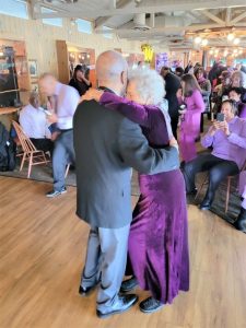 Barbara Freels wasn’t going to be kept down at her 100th birthday party. She is shown here dancing with one of her sons.