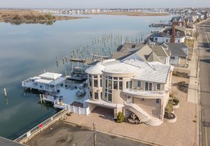 The home sits on a corner bayfront lot