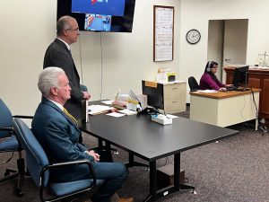 Wildwood Mayor Peter Byron (seated) in court May 19 with his attorney