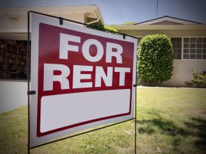 For Rent Sign in front of a house