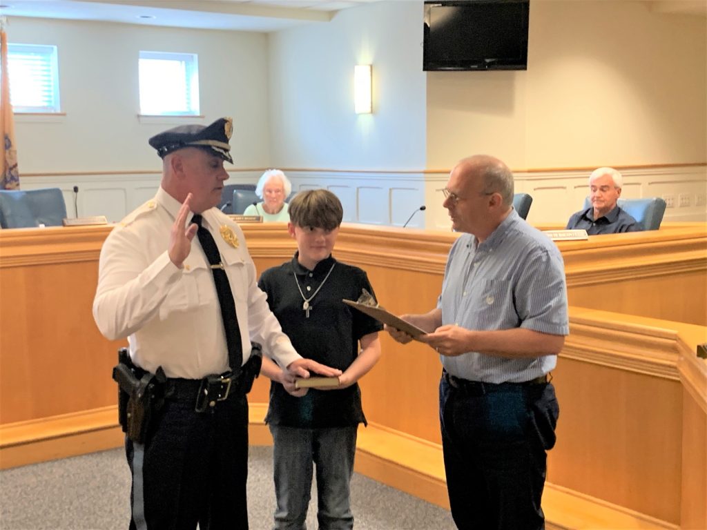 Deputy Chief William Etsell (left) is sworn