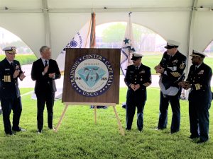 The official logo for the 75th anniversary of U.S. Coast Guard Training Center Cape May (TRACEN) is unveiled