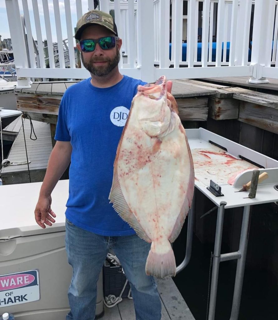 Kyle with a nice flounder.