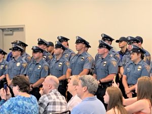 Law enforcement officers pack the room at a promotion ceremony for new Wildwood Police Department Chief Joseph Murphy