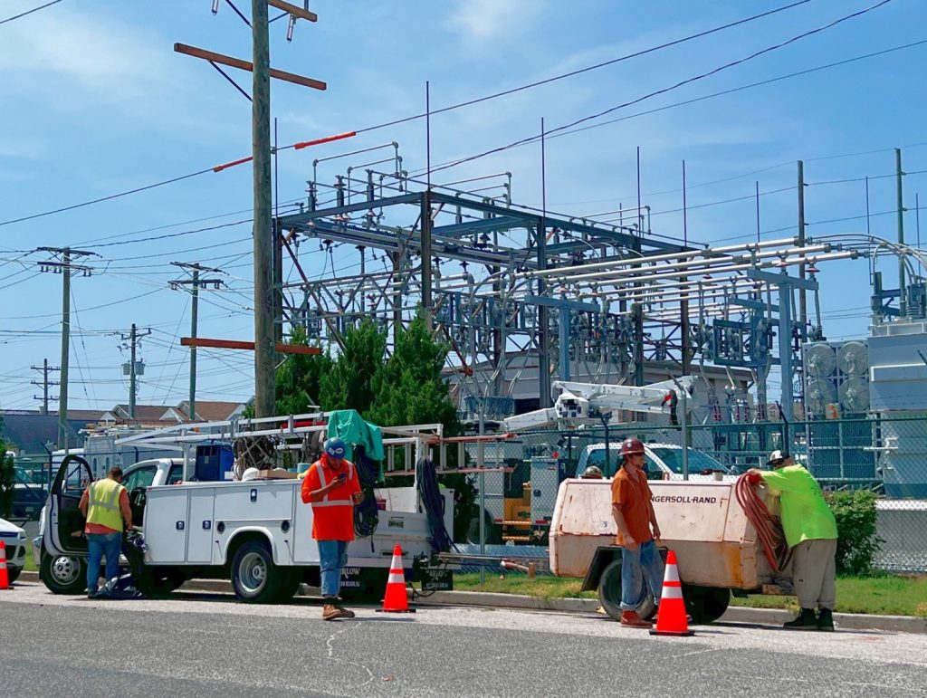 Atlantic City Electric crews work to restore power at the utility's electric plant substation on Lake Avenue in Wildwood at about 11:30 a.m. July 8.