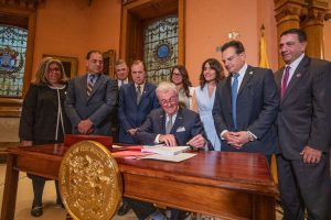 Gov. Phil Murphy signs the fiscal year 2024 budget in Trenton