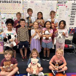 Kids post with their teddy bears as part of "Teddy Bears for Kids" at West Cape May Elementary.